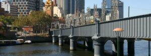 The former rail bridge over the Yarra at Flinders St is a major feature (2007)