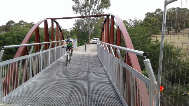 A cyclist on the new Quarry Road Bridge