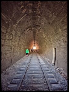 Inside Tunnel No. 6 (at the top) where the rail trail group has retained some track and unique 