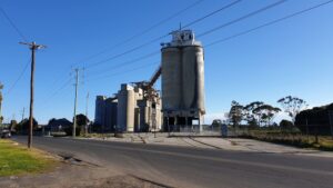 The reason for the railway was the former Geelong Cement works, bringing in briquettes etc to make the cement and then transporting the cement all over Victoria and interstate. This has now been demolished. [2019]