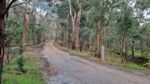 Kibell Lane is mostly on the old formation and now part of the rail trail to Yackandandah. It is reasonably smooth and lightly trafficked [2021] 