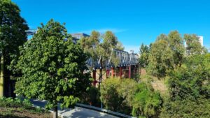 The Bradfield Bridge across the Bremer River from the North Ipswich shopping centre [2022]